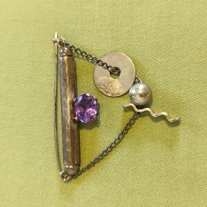 Handcrafted Artisan Metal Brooch with Purple Gemstone